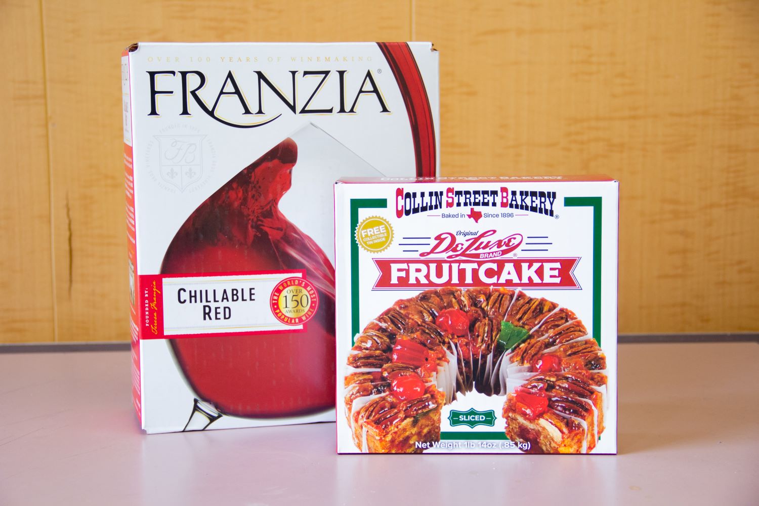 Collin Street Bakery Fruit Cake and Franzia Red Wine